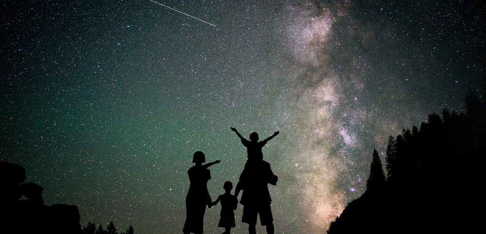 Happy-family-silhouette-with-Milky-Way
